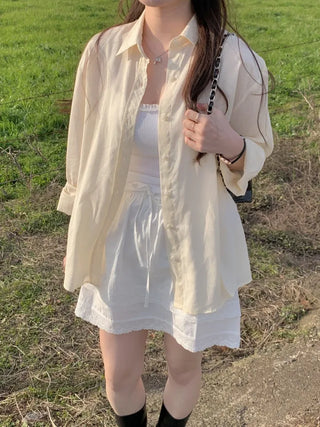 Loose-fit linen shirt (4c)