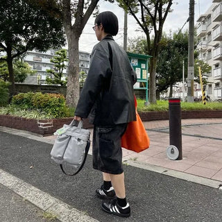 Faux leather mid-length coat