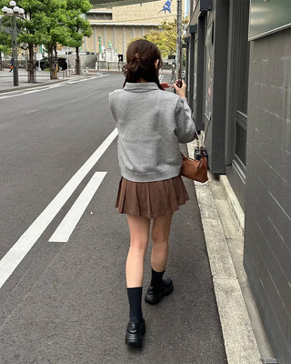 Belted corduroy pleated mini skirt