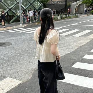 Tiered puff-sleeve blouse