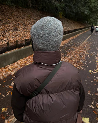 Knit hat with button ear flaps