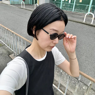 Tinted oval sunglasses