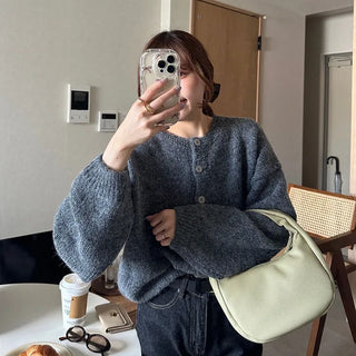 Loose-fitting button-up wool cardigan