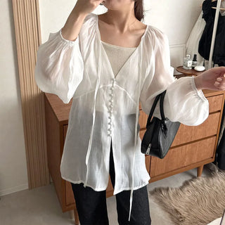 Deep V-neck sheer blouse