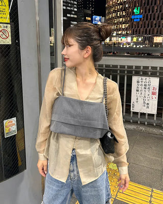 See-through balloon button blouse