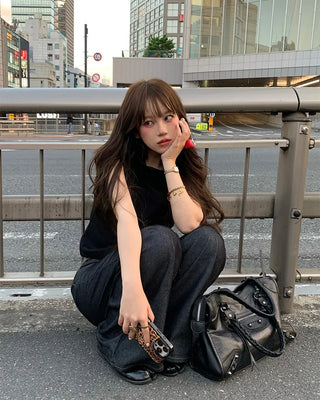 High-neck button-down sleeveless top