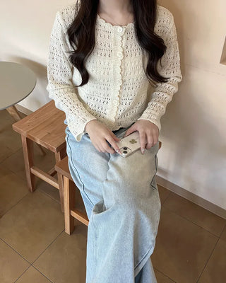 Wave punching cardigan