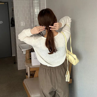 Ribbed long-sleeve wool knit