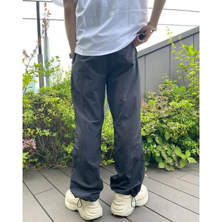 Two-pleat detail string pants