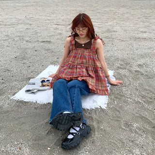 Checked sleeveless blouse