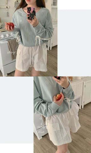 Loose-fitting stitched ribbon V-neck sweatshirt (4c)