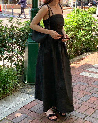 Side-tucked flared long dress