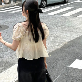 Tiered puff-sleeve blouse