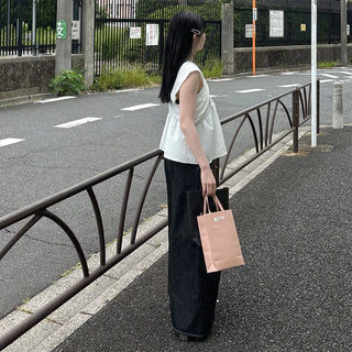 Asymmetrical design top