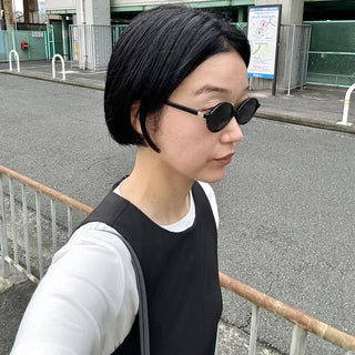 Tinted oval sunglasses