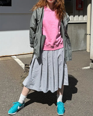 Checked pleated midi skirt