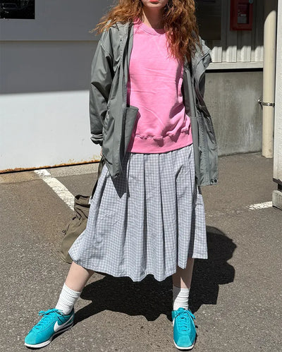 Checked pleated midi skirt