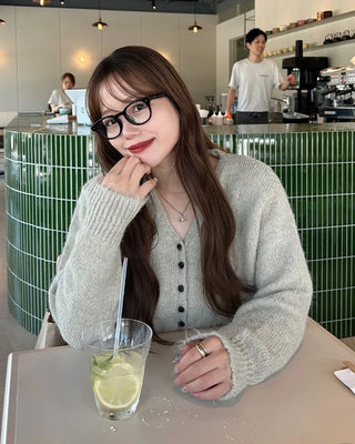 Black button-up V-neck cardigan