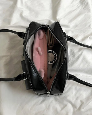Two-pocket half-moon shoulder bag