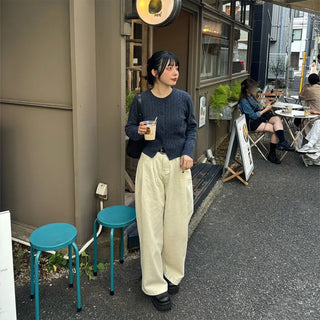 Tucked wide-leg pants