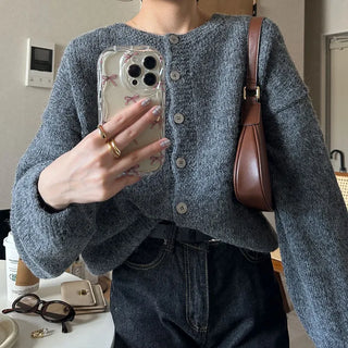 Loose-fitting button-up wool cardigan