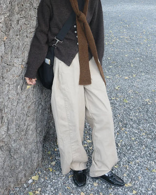 Side-tucked white cotton pants