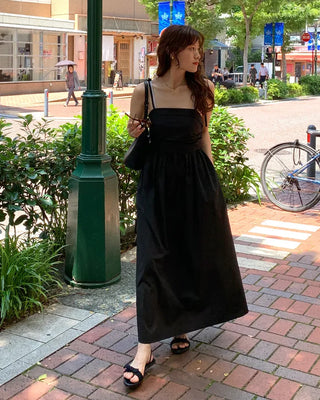 Side-tucked flared long dress