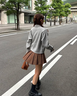 Belted corduroy pleated mini skirt
