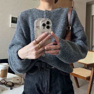 Loose-fitting button-up wool cardigan