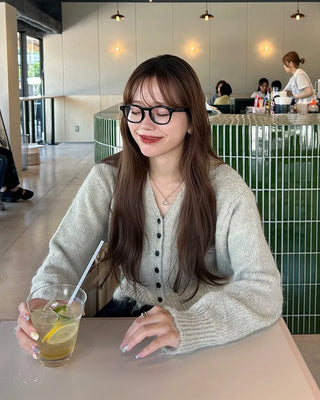 Black button-up V-neck cardigan