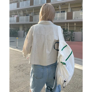 Striped long-sleeved cropped shirt