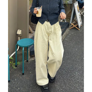 Tucked wide-leg pants