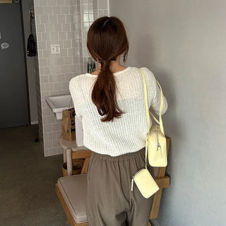 Ribbed long-sleeve wool knit