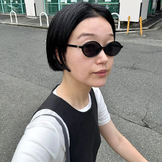 Tinted oval sunglasses