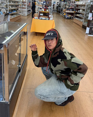 Camouflage knit hooded zip-up