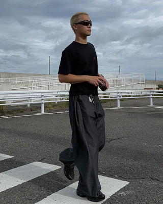 Side-tuck denim slacks