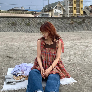 Checked sleeveless blouse