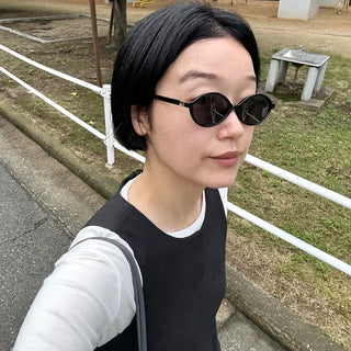 Tinted oval sunglasses