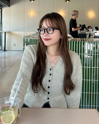 Black button-up V-neck cardigan