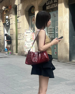Square studded shoulder bag
