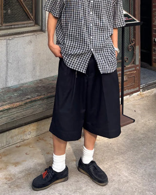 Double-pleated Bermuda shorts