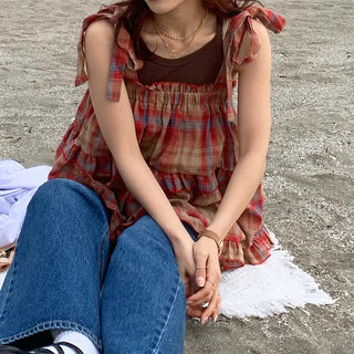 Checked sleeveless blouse