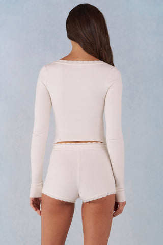 Knit Mid-Rise Mini Shorts in Ivory