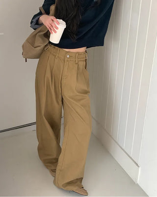 Wide-leg pants with buckle pleats