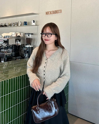 Black button-up V-neck cardigan