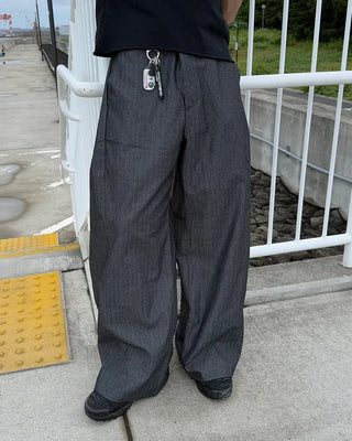 Side-tuck denim slacks