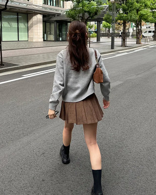 Belted corduroy pleated mini skirt