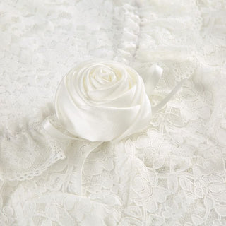 Long flared sleeve lace flower applique top