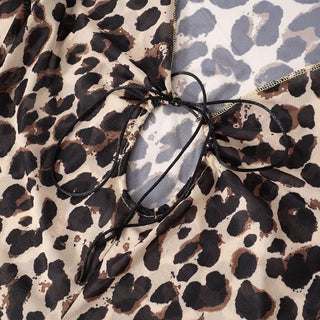 Leopard print v neck self tie long flared sleeve top