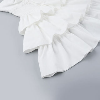 Smocked ruffle self tie mini dress